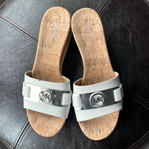 MICHAEL Michael Kors wedge sandals in white with silver buckle